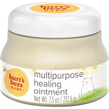 A white tub of Burt's Bees Baby 100% Natural Origin Multipurpose Healing Ointment with a yellow label.