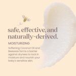 A white tub of Burt's Bees Baby 100% Natural Origin Multipurpose Healing Ointment with a yellow label.