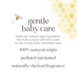 A white tub of Burt's Bees Baby 100% Natural Origin Multipurpose Healing Ointment with a yellow label.