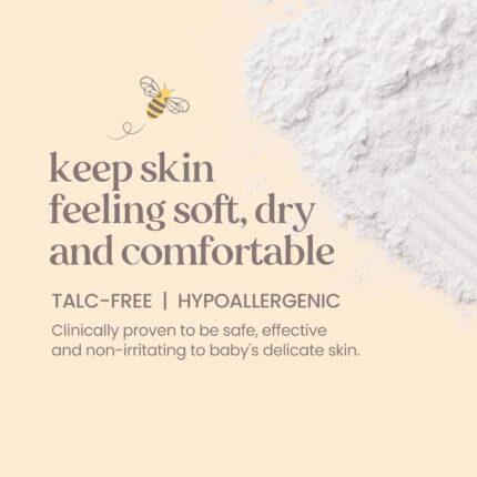 A white bottle of Burt's Bees Baby Dusting Powder with a yellow label and a picture of a baby.