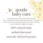 A white bottle of Burt's Bees Baby Dusting Powder with a yellow label and a picture of a baby.