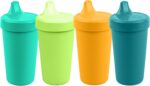 Four Re-Play spill-proof sippy cups in aqua, lime, yellow, and teal with lids and silicone valves.