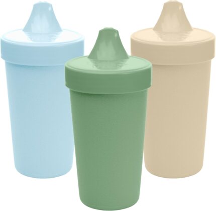 Three Re-Play spill-proof sippy cups in Beach Baby colors, with lids and silicone valves, on a plain background.