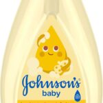 Large bottle of tear-free head-to-toe baby wash and shampoo with a gentle scent, suitable for all hair types.